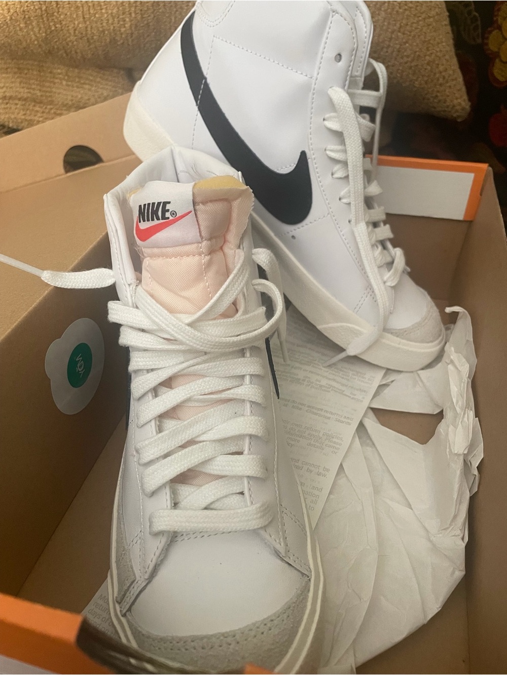 Nike Women’s White High-Top Sneakers with Black Swoosh and Pale Pink Tongue